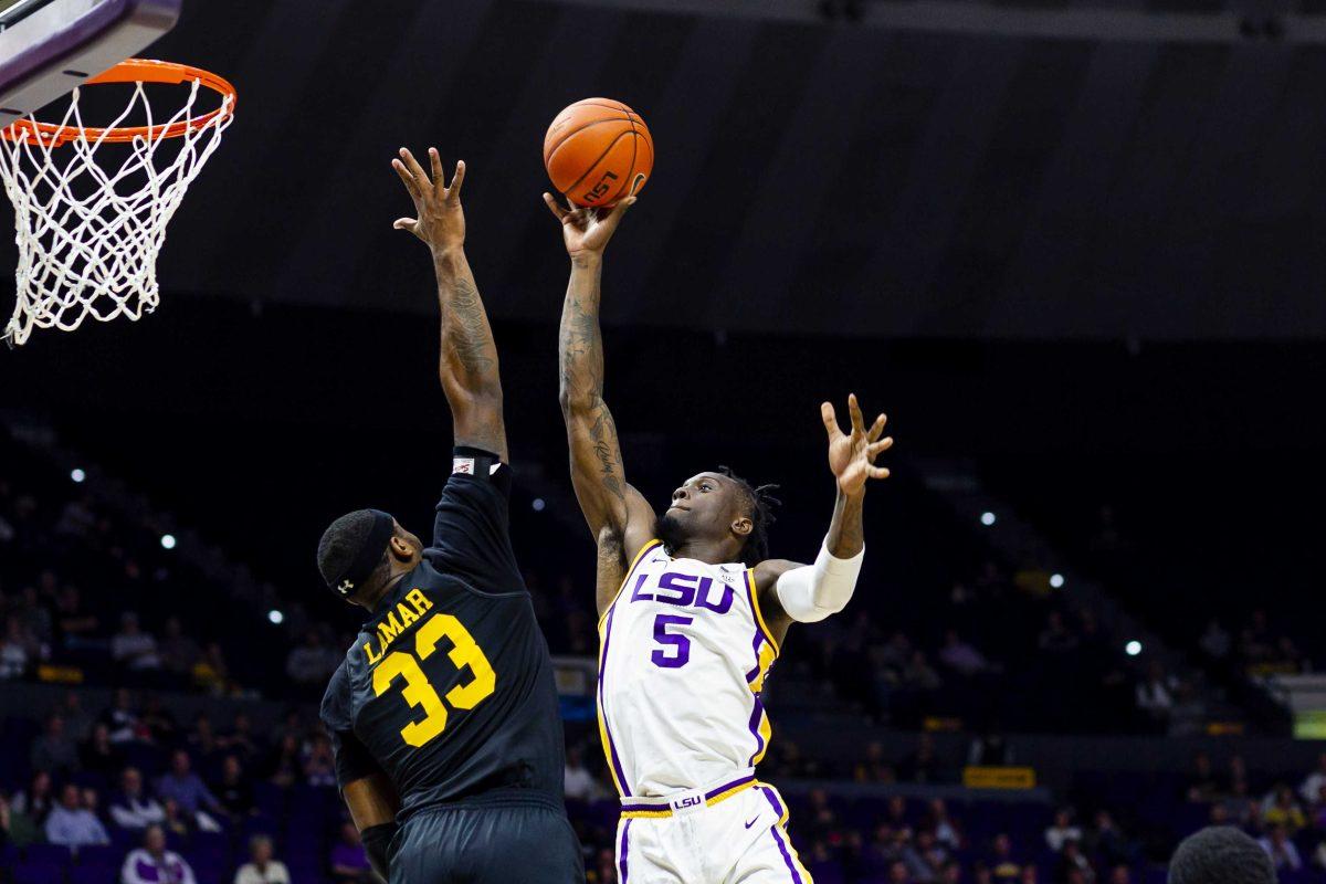 LSU sophomore forward Emmitt Williams (5) shoots the ball during the Tigers' 77-50 victory over UMBC on Tuesday, Nov. 19, 2019, in the PMAC.