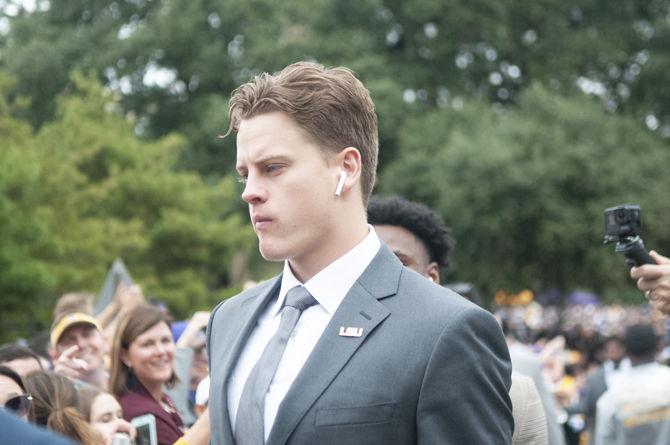 LSU senior quarterback Joe Burrow (9) walks down Victory Hill on Saturday, Oct. 26, 2019.