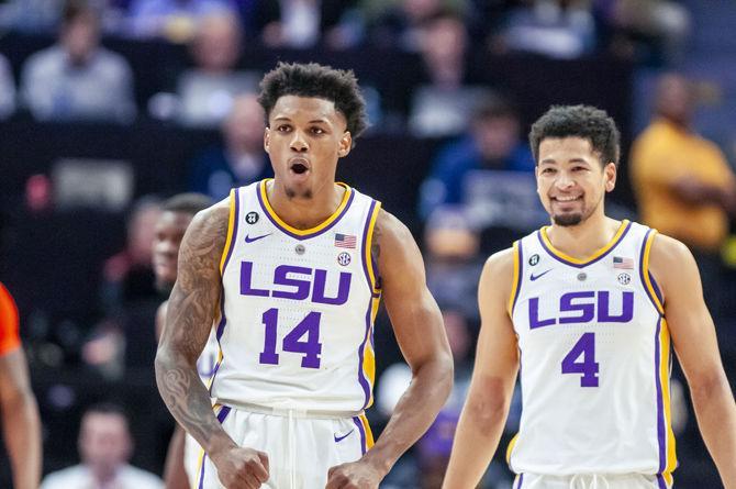 LSU junior guards Marlon Taylor (14) and Skylar Mays (4) celebrate after a basketball during the Tigers' 83-78 victory over Auburn on Saturday, Feb. 9, 2019, in the PMAC.