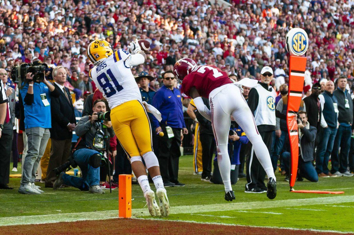 LSU junior tight end Thaddeus Moss (81) catches the ball during the Tigers' game against Alabama in Bryant-Denny Stadium on Saturday, Nov. 9, 2019.