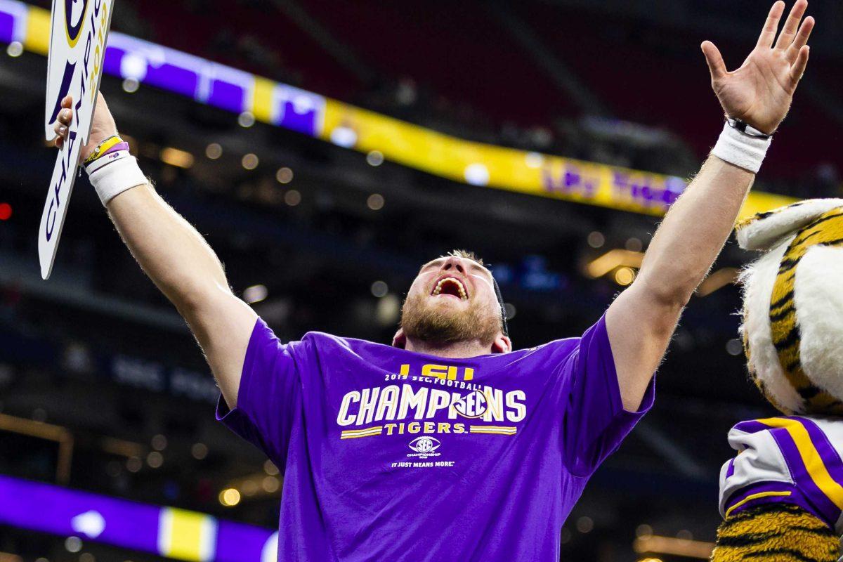 LSU senior long snapper Blake Ferguson celebrates after the Tigers' 37-10 victory over Georgia on Saturday, Dec. 7, 2019, in Mercedes Benz Stadium.