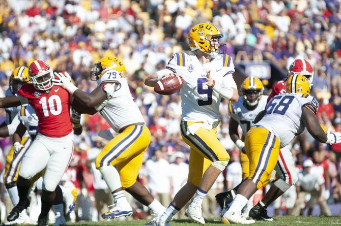 LSU quarterback Joe Burrow (9) looks to pass against Georgia on Oct. 13, 2018.