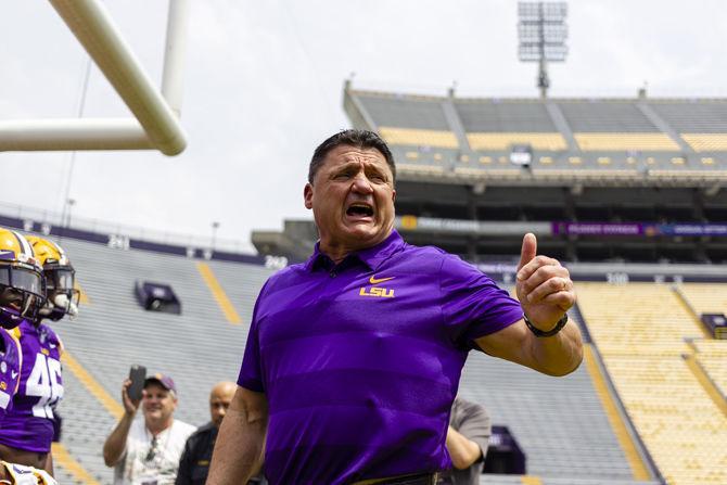 LSU football coach Ed Orgeron enters Tiger Stadium before the Tigers' spring football game on Saturday, April 6, 2019.