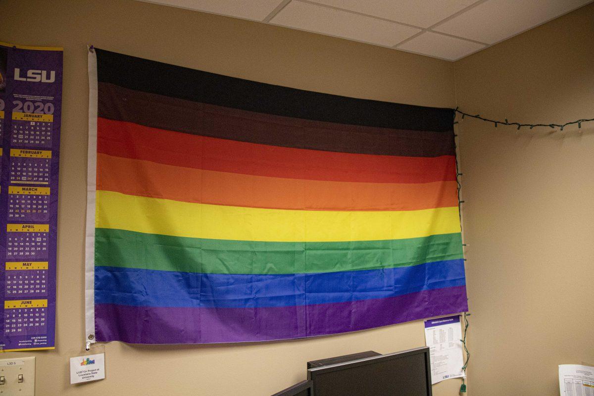 A pride flag hangs in the LGBTQ+ Project offices in the Office of Multicultural Affairs in the Student Union on Wednesday, Jan. 15, 2020.