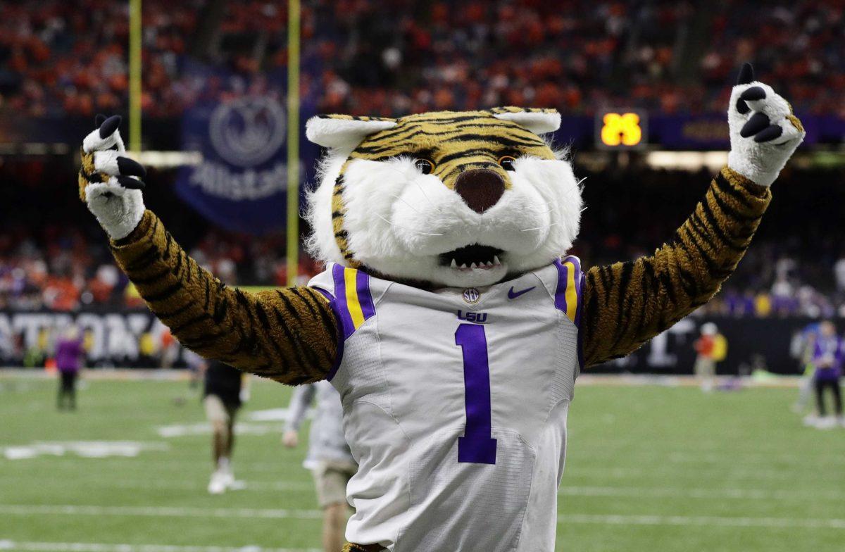 The LSU mascot arrives before a NCAA College Football Playoff national championship game against Clemson Monday, Jan. 13, 2020, in New Orleans. (AP Photo/Sue Ogrocki)