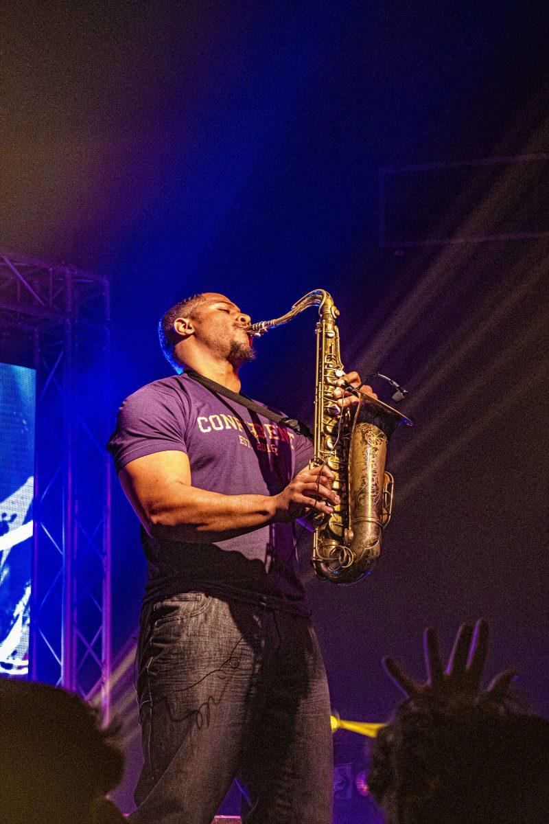 The saxophone player shines in the light on Wednesday, January 22, 2020 during the Two Friends set at The Varsity Theatre in Baton Rouge.