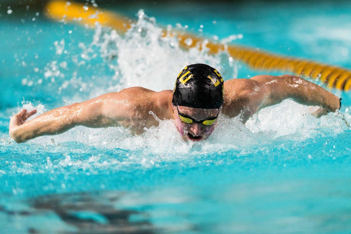 LSU swimmer Lewis Clough competes in a swim meet.