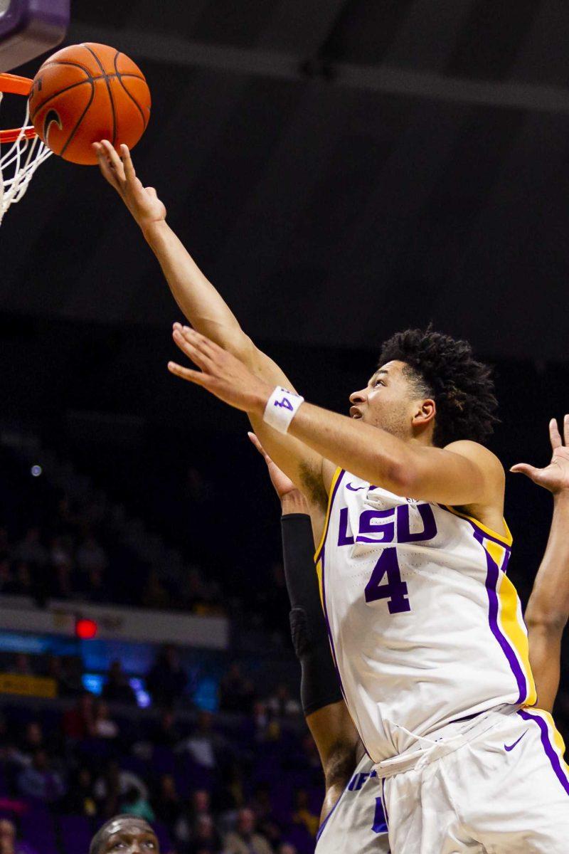 LSU senior guard Skylar Mays (4) lays the ball in over a defender during the Tigers' 90-54 victory over the University of New Orleans on Wednesday, Dec. 3, 2019, in the PMAC.