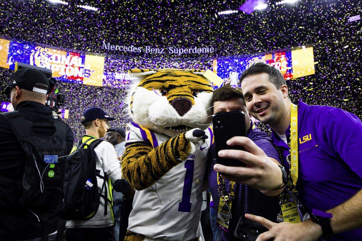 Mike the Tiger poses for a photo on the field after the Tigers 45-25 victory over Clemson in the Mercedes Benz Super Dome, on Monday, Jan. 13, 2020.