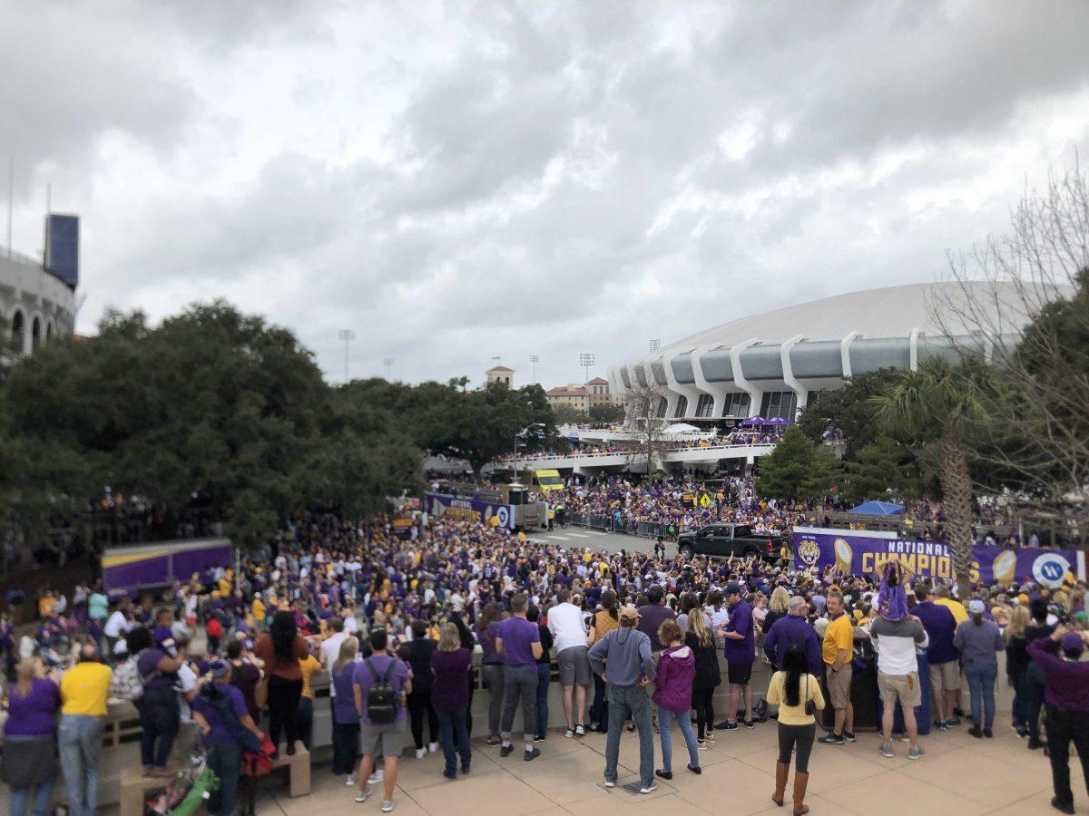 The final floats roll past the cheering crowds at LSU football's national championship parade in Baton Rouge, La. on Jan. 18, 2020.