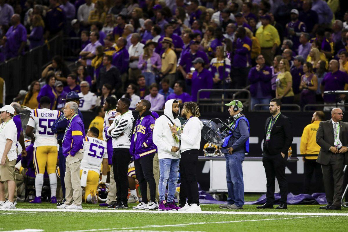 Cleveland Browns wide receiver Odel Beckham Jr. and Kansas City Chiefs safety Tyran Matheu stand on the sidelines during the Tigers 45-25 victory over Clemson in the Mercedes Benz Super Dome, on Monday, Jan. 13, 2020.