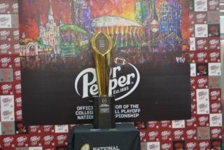 The National Championship trophy on display at the Walmart on College Drive on Thursday, Jan. 16.