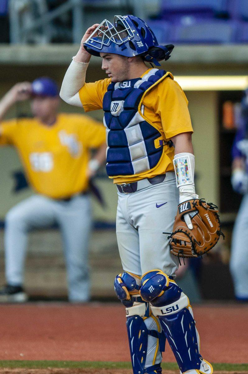 LSU freshman catcher Alex Milazzo (20) prepares for a pitch during the Tigers' scrimmage on Thursday, Oct. 3, 2019, in Alex Box Stadium.