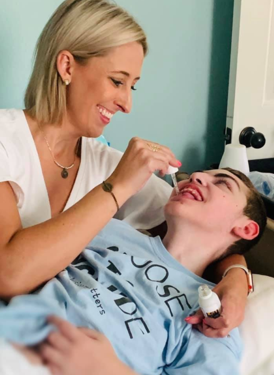 Katie Corkern administering medical marijuana to her son Connor Corkern, who experiences up to 200 seizures per day.