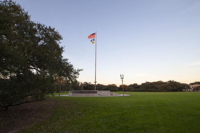 The sun sets above the parade ground on Monday, Jan. 21, 2019.