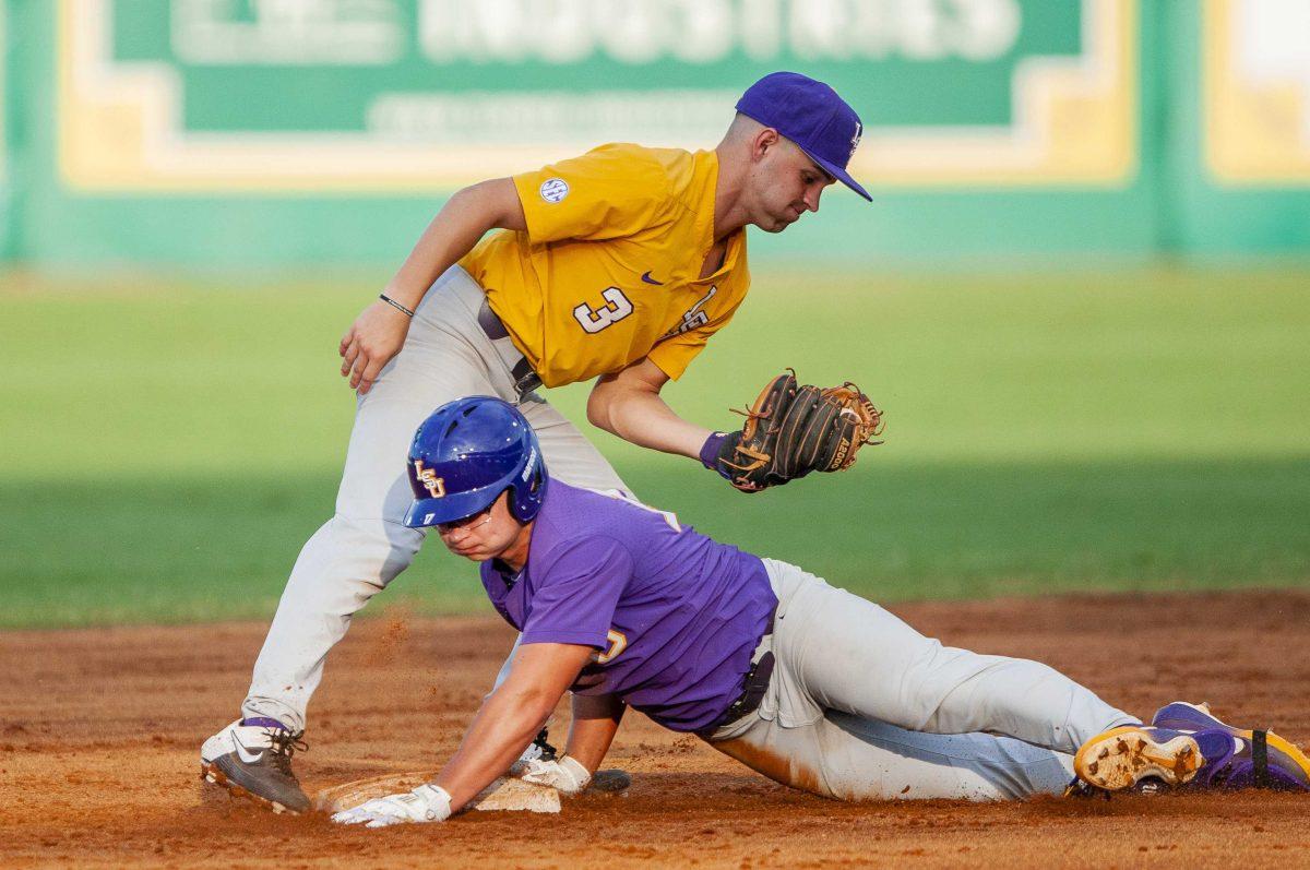 LSU junior infielder Hal Hughes (3) catches the ball during the Tigers' scrimmage on Thursday, Oct. 3, 2019, in Alex Box Stadium.