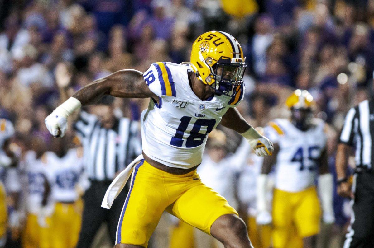 LSU sophomore linebacker K'lavon Chaisson (18) celebrates on Saturday, Oct. 12, 2019, during the Tigers' 42-28 victory against the Gators in Tiger Stadium.