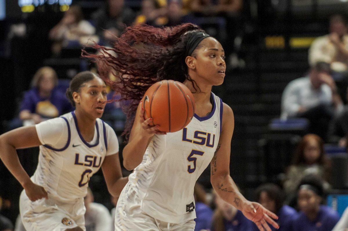 LSU senior forward Ayana Mitchell (5) pushes forward with the ball during the Lady Tigers' 62-52 victory against Southeastern on Wednesday, Nov. 20, 2019 in the PMAC.