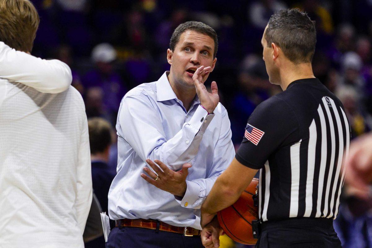 LSU basketball coach Will Wade speaks to a ref after a play out during the Tigers' 90-54 victory over the University of New Orleans on Wednesday, Dec. 3, 2019, in the PMAC.