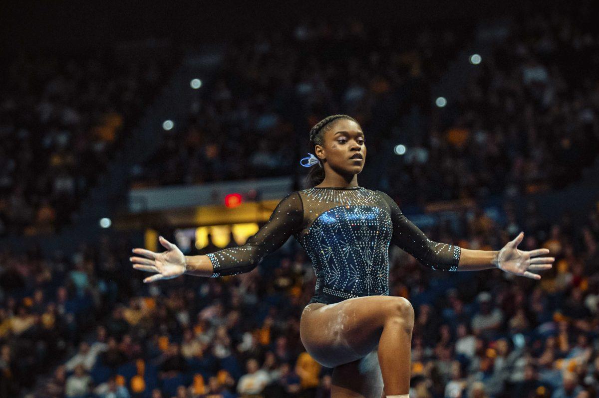 LSU gymnastics freshman Kiya Johnson performs her beam routine on Friday, January 2020 during LSU's 196.775 to 196.425 loss to Alabama in the PMAC.