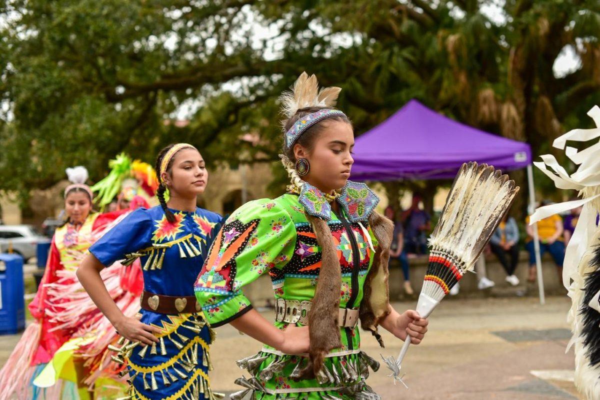 Native American Student Organization members perform a traditional dance on LSU's campus.