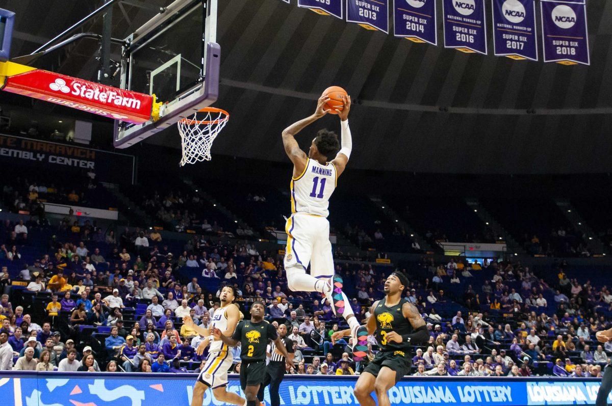 LSU junior guard Charles Manning Jr. (11) grabs a lob pass during the Tigers' 77-50 victory over UMBC on Tuesday, Nov. 19, 2019, in the PMAC.