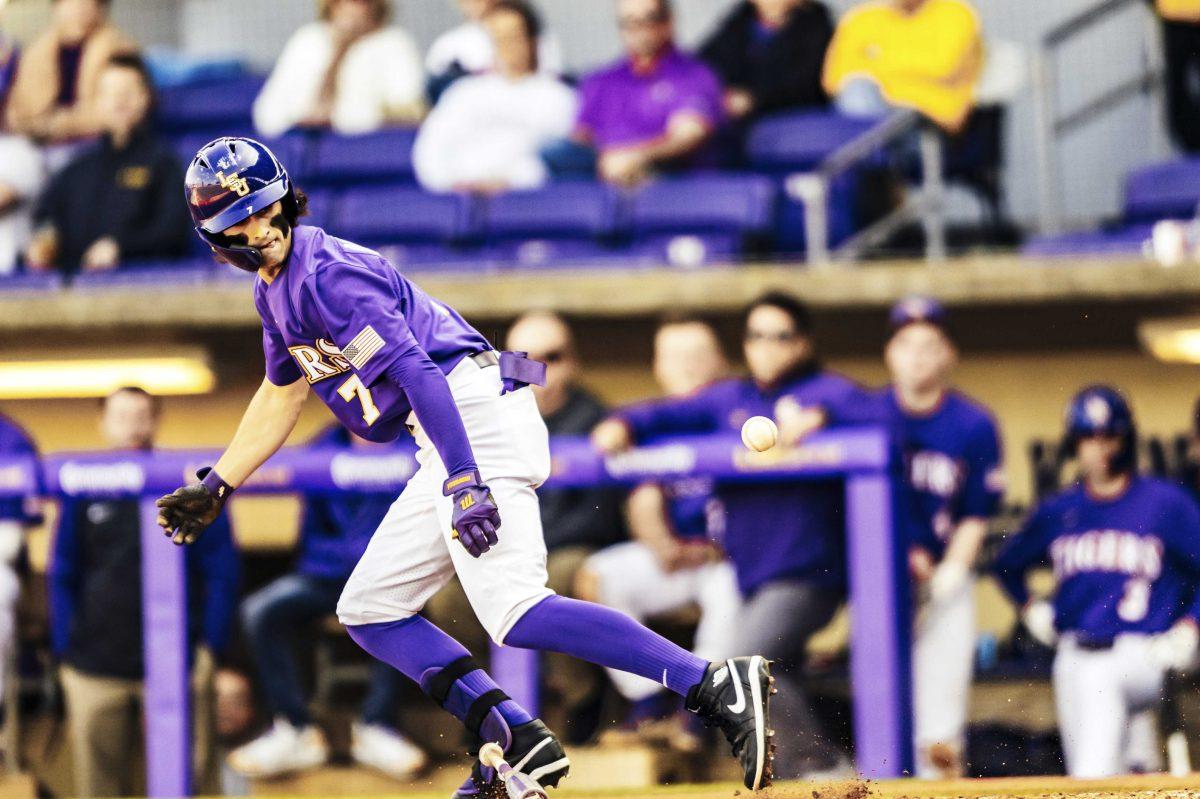 LSU baseball sophomore Giovanni Digiacomo (7) runs after bunting the ball during LSU's 7-4 victory against Indiana in Game 2 on Saturday, Feb. 15, 2020 in Alex Box.