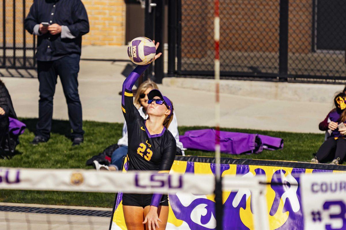 LSU beach volleyball sophomore Ashlyn Rasnick-Pope (23) serves during the Purple vs. Gold scrimmage on Saturday, Feb. 15, 2020 at the Beach Volleyball Complex.