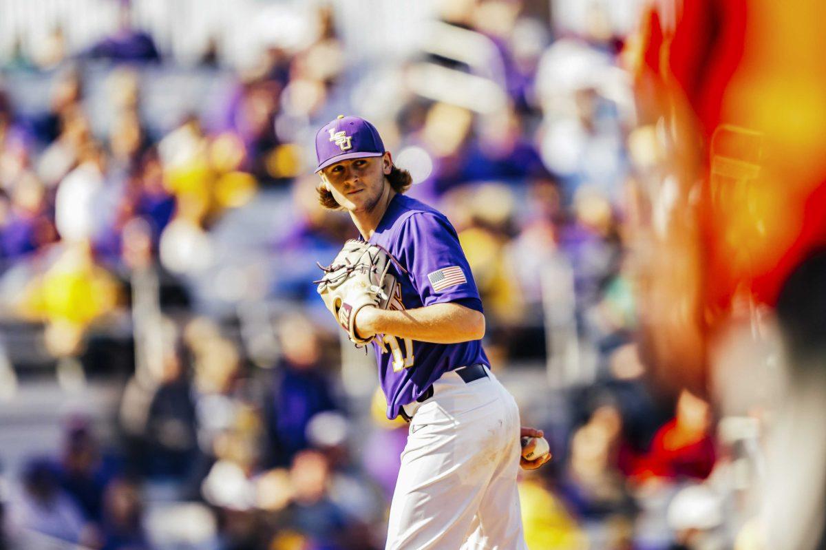 LSU baseball right-handed pitcher sophomore Landon Marceaux (11) prepares to pitch during LSU's 7-4 victory against Indiana in Game 2 on Saturday, Feb. 15, 2020 in Alex Box.