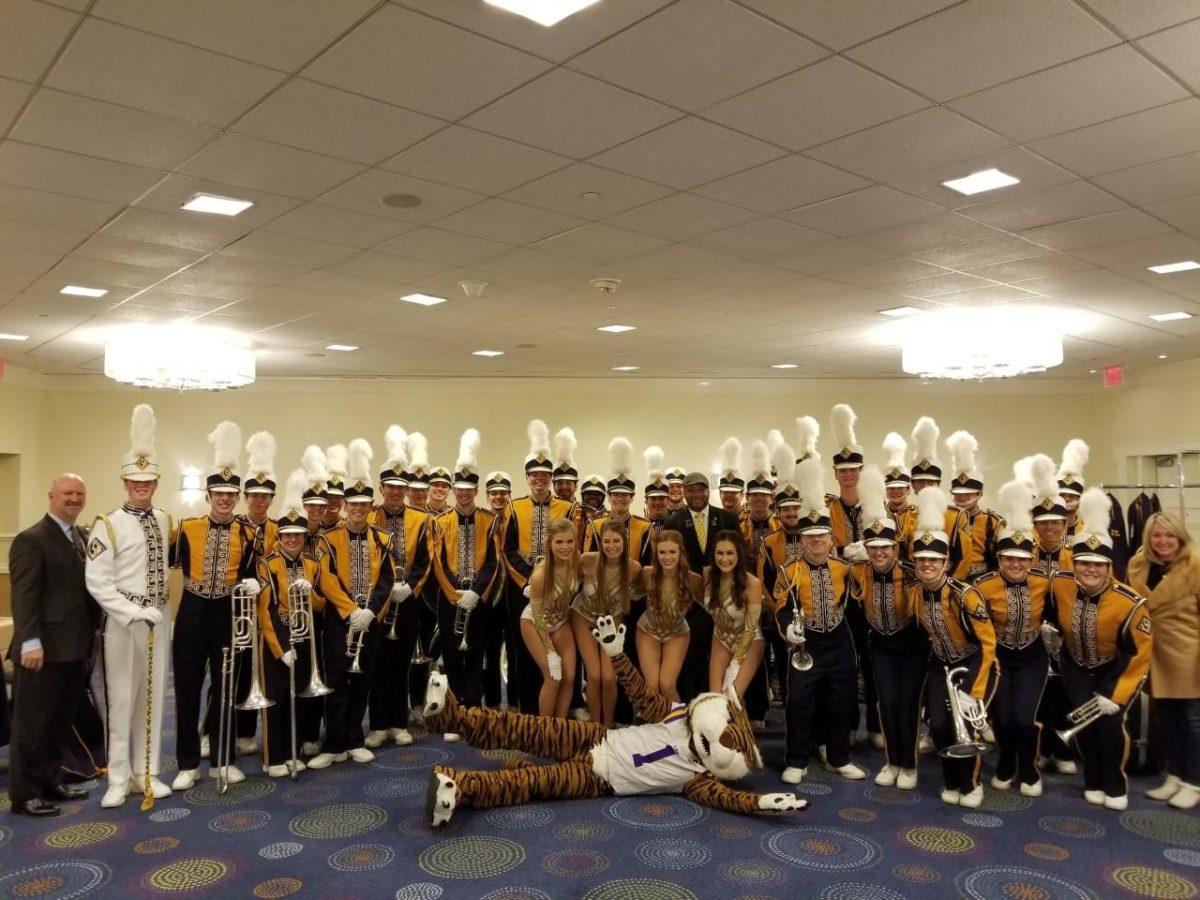 The LSU Tiger Band poses for a picture at Washington Mardi Gras in Washington D.C.