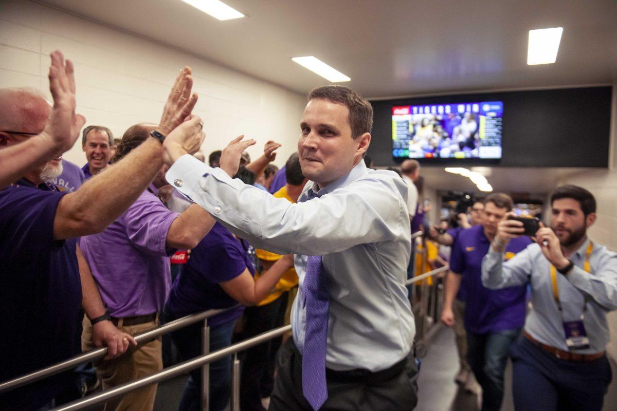 LSU basketball coach Will Wade interacts with fans during the Tigers' 82-30 victory over Tennessee on Saturday, Feb. 23, 2019, in the PMAC