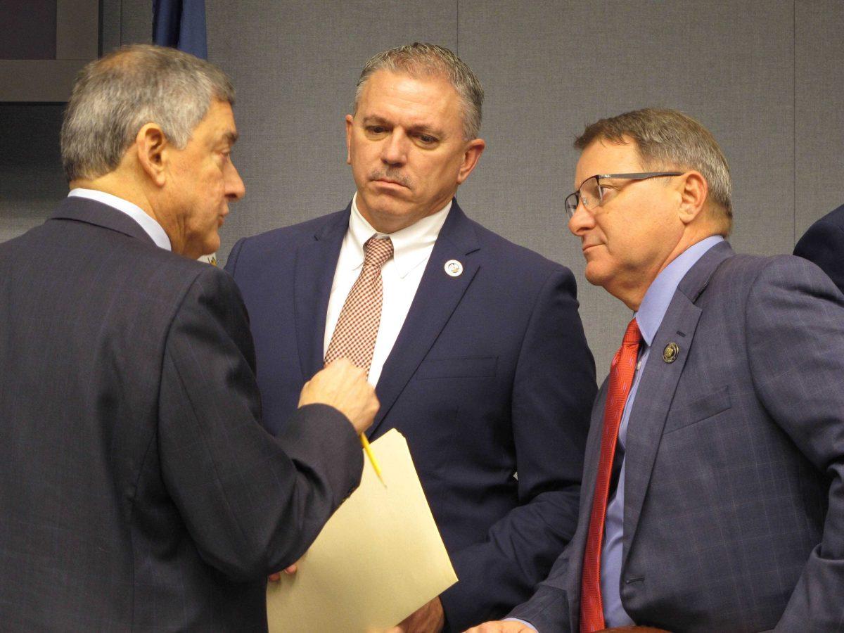 Commissioner of Administration Jay Dardenne, the governor's chief budget adviser, left; House Speaker Clay Schexnayder, R-Gonzales, center; and Senate President Page Cortez, R-Lafayette, speak ahead of a meeting of Louisiana's income forecasting panel on Friday, Feb. 7, 2020, in Baton Rouge, La. (AP Photo/Melinda Deslatte)