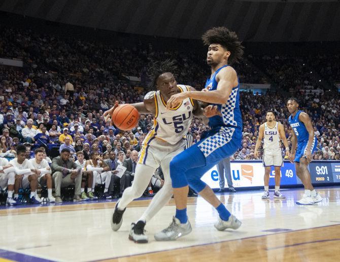 LSU sophomore forward Emmitt Williams (5) dribbles the ball during the Tigers' 79-76 loss to Kentucky on Tuesday, Feb. 18, 2020, in the PMAC.