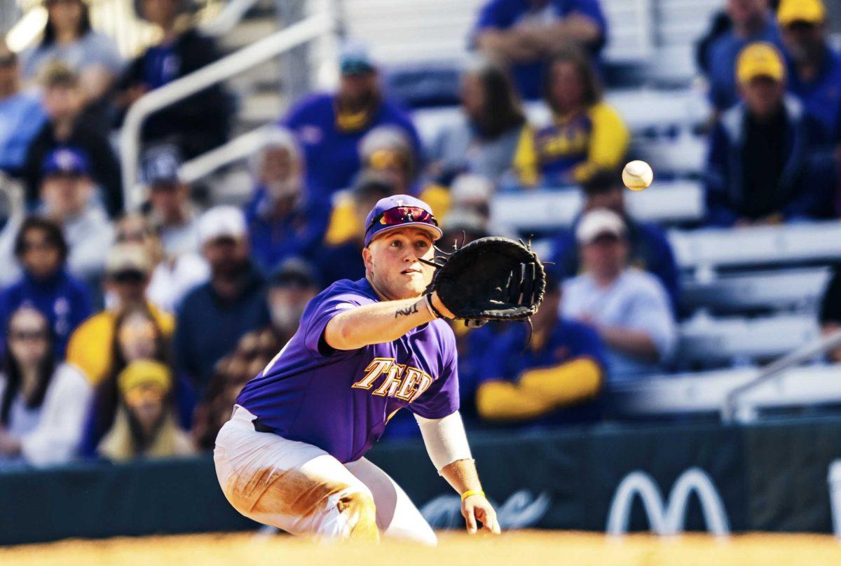 LSU baseball first base sophomore Cade Beloso (24) catches a ball during LSU's 7-4 victory against Indiana in Game 2 on Saturday, Feb. 15, 2020 in Alex Box.