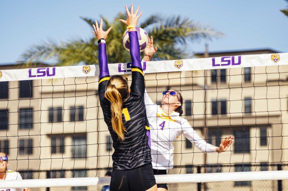 LSU beach volleyball sophomore Melia Lindner (4) spikes the ball during the Purple vs. Gold scrimmage on Saturday, Feb. 15, 2020 at the Beach Volleyball Complex.