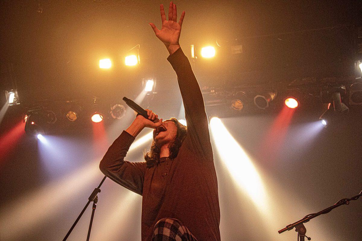 Josh of Neutral Snap reaches to the sky on Friday, January 31, 2020 during the band's opening performance at The Varsity Theatre in Baton Rouge.