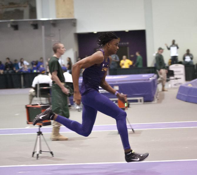 LSU freshman jumper JuVaughn Blake runs down the track during the Bayou Bengal Invitational on Friday, Feb. 2, 2018 in the Carl Maddox Field House.