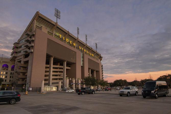 The sun sets above Tiger Stadium on Monday, Jan. 21, 2019.