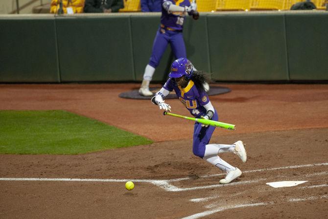 <p>LSU junior outfielder Aliyah Andrews (4)hits the ball during the Lady Tigers' 19-1 victory over Tulsa, Thursday, Feb. 7, 2019, in Tiger Park.</p>