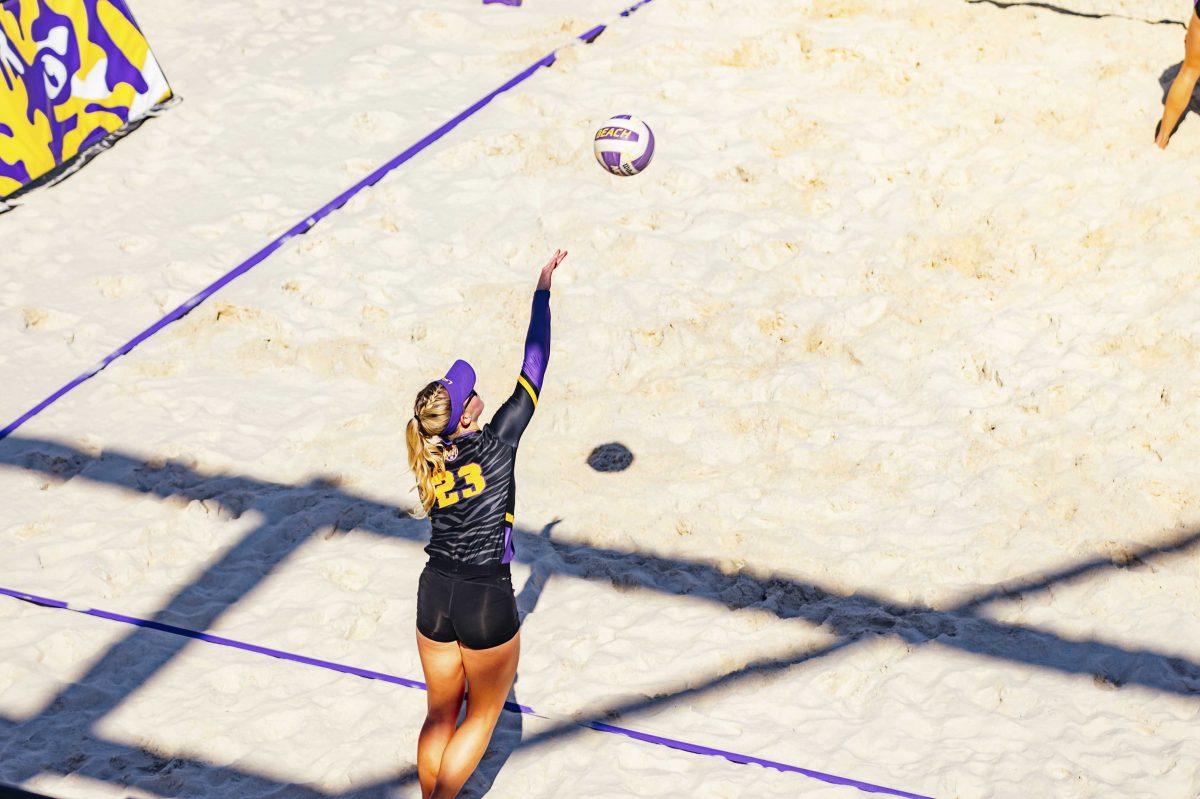 LSU beach volleyball sophomore Ashlyn Rasnick-Pope (23) serves the ball during the Purple vs. Gold scrimmage on Saturday, Feb. 15, 2020 at the Beach Volleyball Complex.