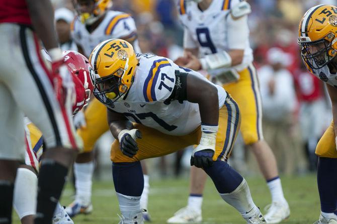 LSU sophomore offensive tackle Saahdiq Charles (77) prepares to guard opponent on Saturday, Oct. 13,2018