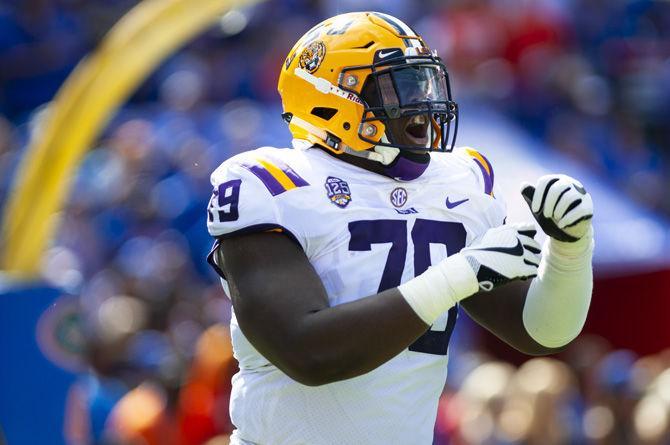 LSU sophomore center Lloyd Cushenberry III (79) celebrates a good play during the Tigers&#8217; 27-19 loss against the University of Florida on Saturday, Sept. 2018 in Ben Hill Griffin Stadium.