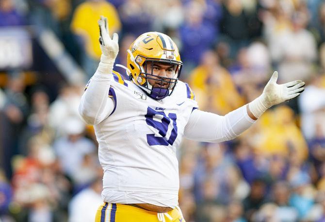 LSU senior defensive linemen Rashard Lawrence (90) celebrates during the Tigers' 23-20 win over Auburn on Saturday, Oct. 26, 2019, at Tiger Stadium.