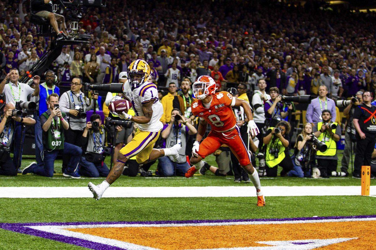 LSU sophomore wide receiver Ja'Marr Chase (1) makes a catch for a touchdown during the Tigers 45-25 victory over Clemson in the Mercedes Benz Super Dome, on Monday, Jan. 13, 2020.