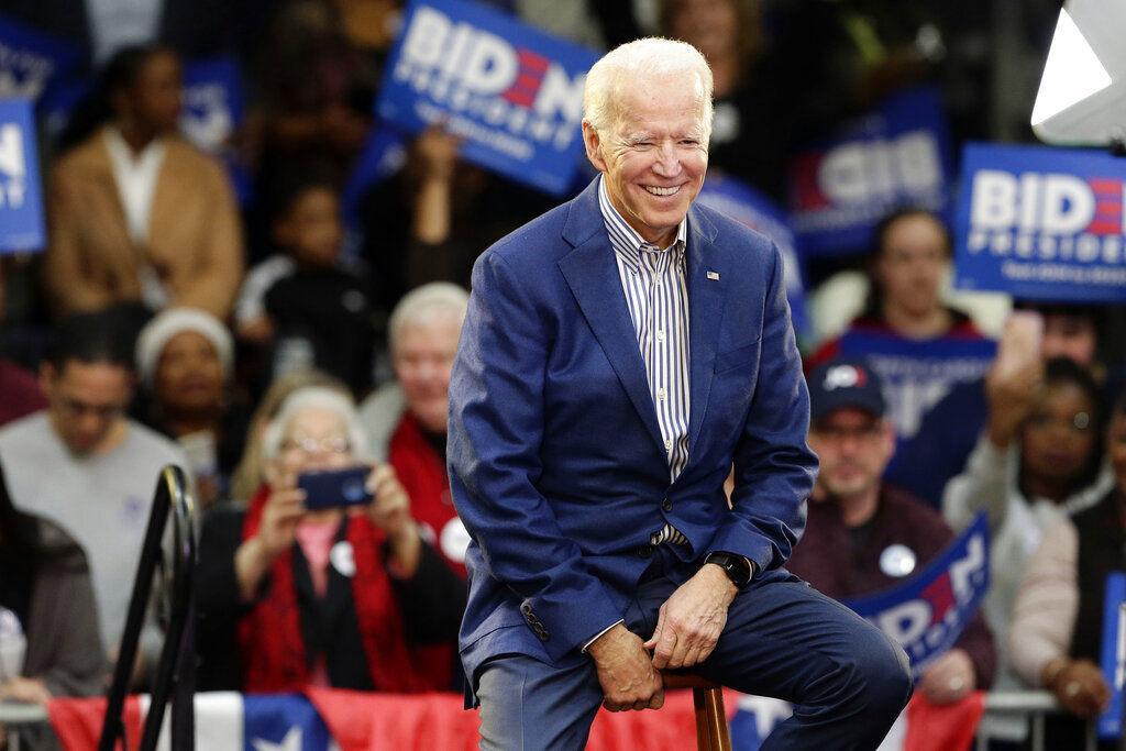 Democratic presidential candidate former Vice President Joe Biden smiles while being introduced at a campaign event at Saint Augustine's University in Raleigh, N.C., Saturday, Feb. 29, 2020. (AP Photo/Gerry Broome)