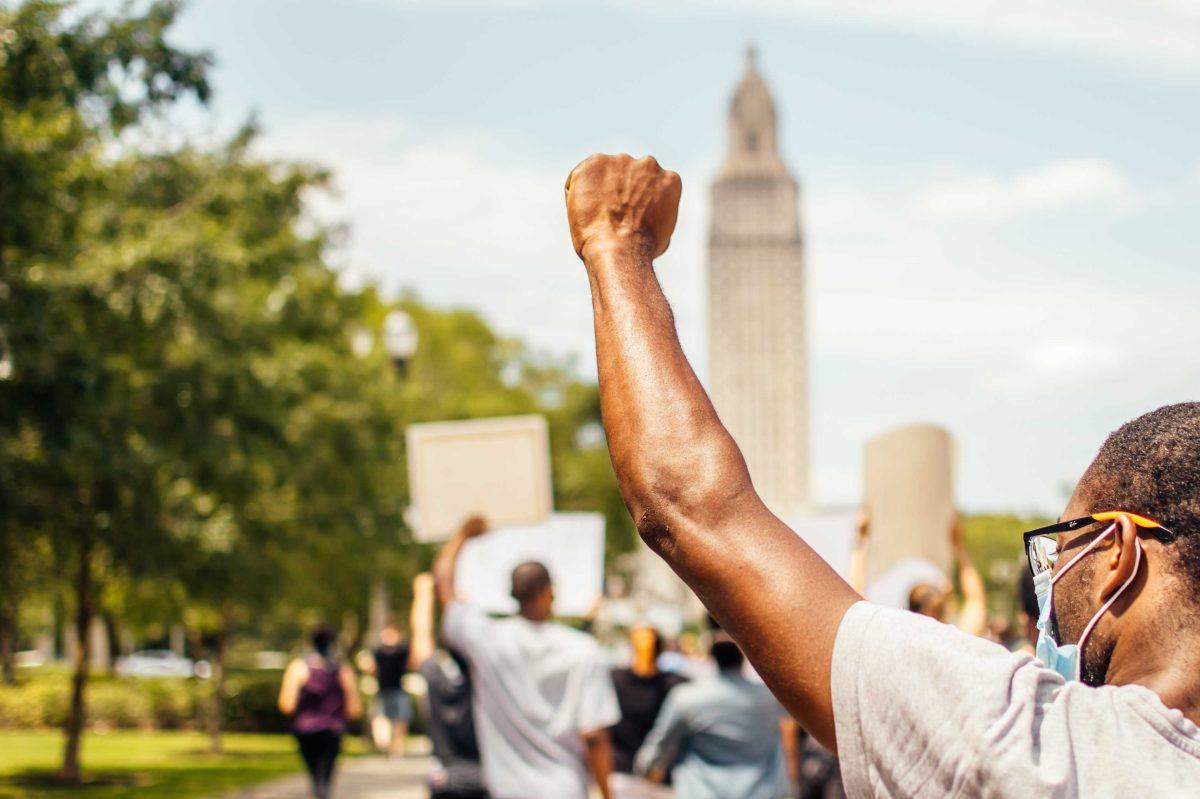 Protesters march peacefully to the State Capitol on Sunday, May 31, 2020 during the protest of the death of George Floyd in Downtown Baton Rouge.