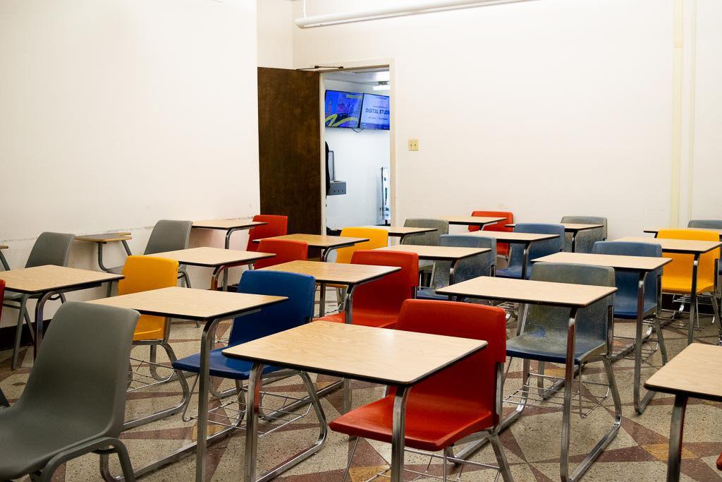 Desks sit in a classroom in the Huey P. Long Field House on February 5, 2020.