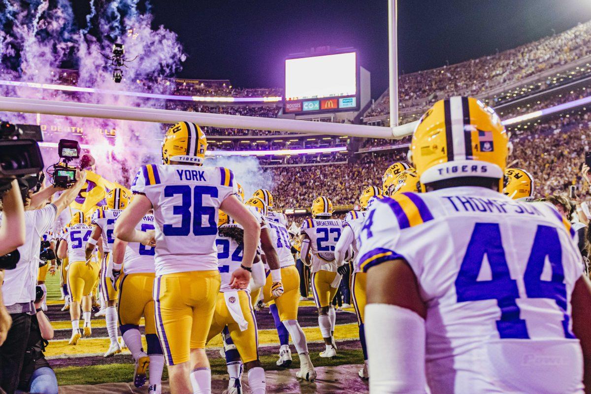 LSU football players enter Tiger Stadium before the LSU vs. Texas A&amp;M game on Saturday, November 30, 2019.