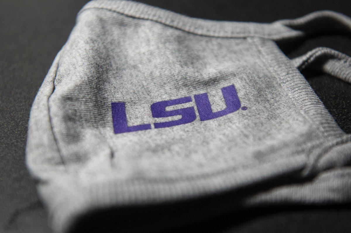 An LSU mask sits on a desk on Tuesday, Aug. 25, 2020 in West Campus Apartments.