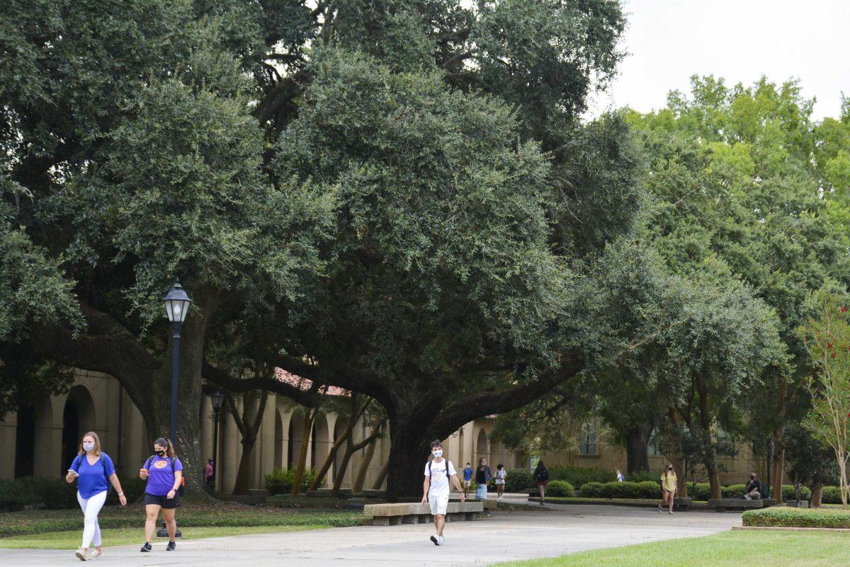 LSU students head to class&#160;Tuesday, Aug. 25, 2020 on their first day of school in the Quad on LSU's campus.